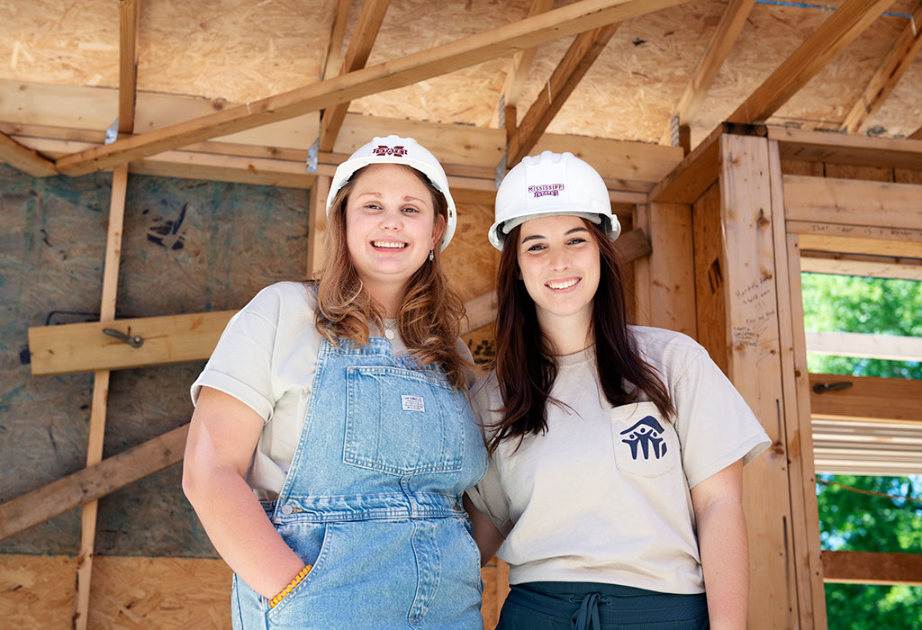 Former president of MSU’s Habitat for Humanity student chapter Margaret Donaldson (left) and current president Kiersten Gilmore said volunteering with the organization is a great way to provide generational change for families.