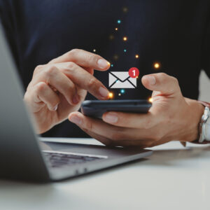 Hand of businessman using smartphone for email with notification alert, Online communication concept.