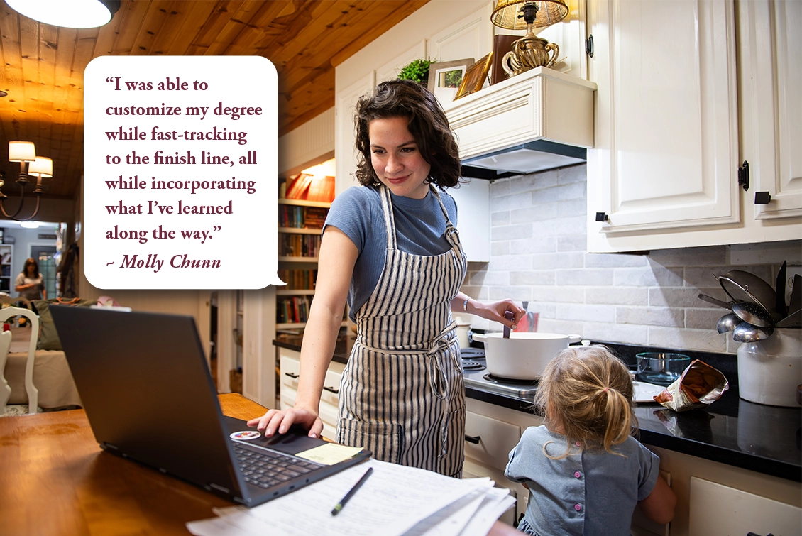 A woman in an apron stands in a kitchen stirring a pot on the stove with a laptop and papers nearby. A child stands beside her. A quote is displayed in the upper left corner.