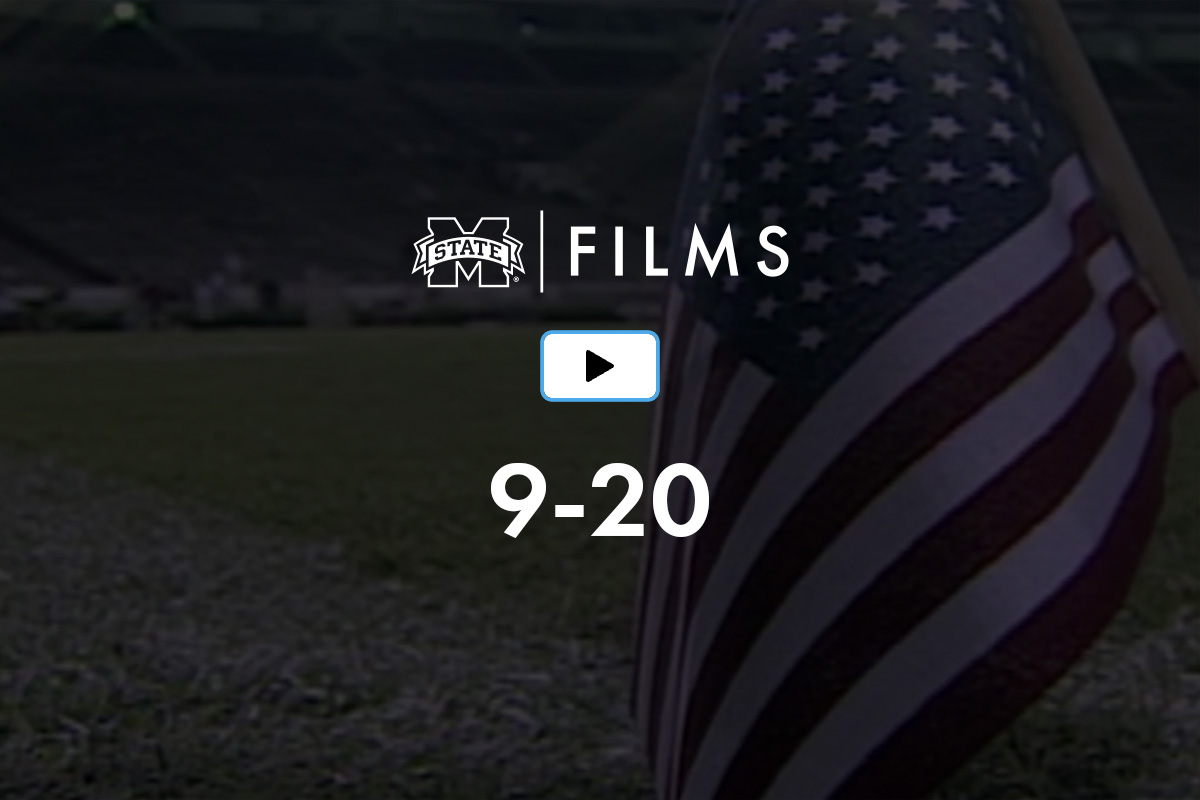 A football field with an American flag, logo, play button icon, and the numbers "9-20".