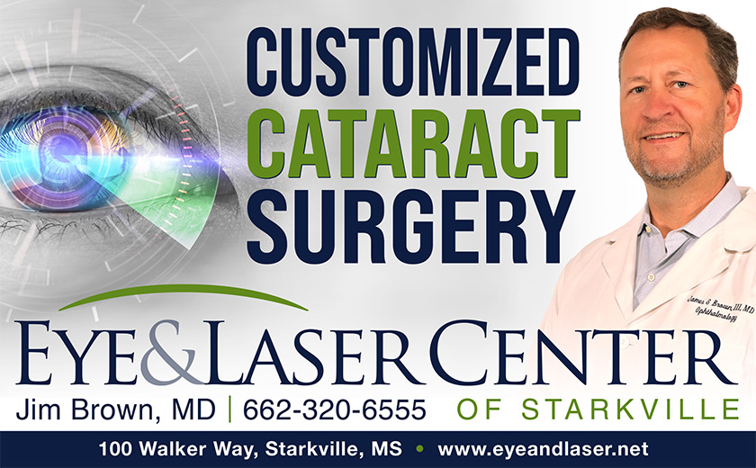Advertisement for cataract surgery at Eye & Laser Center of Starkville, featuring a doctor's portrait, contact information, and a graphic of an eye with digital effects.