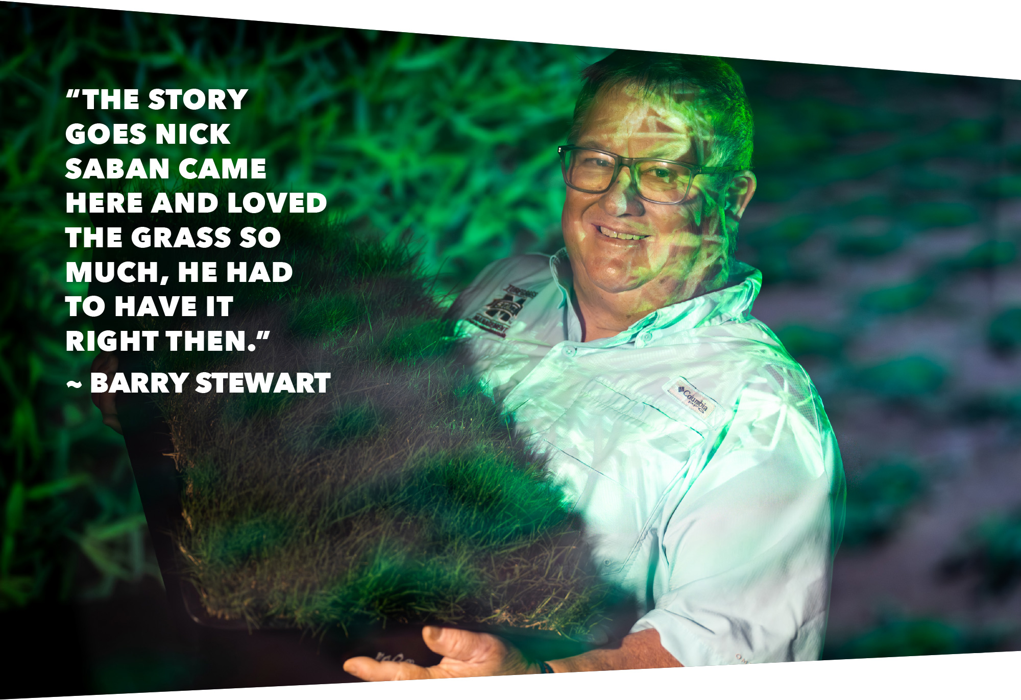 A man in glasses and a light blue shirt holds a square of sod, with a quote about Nick Saban and grass quality by Barry Stewart displayed on the left side of the image.